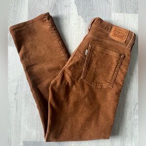 Tan/brown corduroy Levi wedgie straight pants.